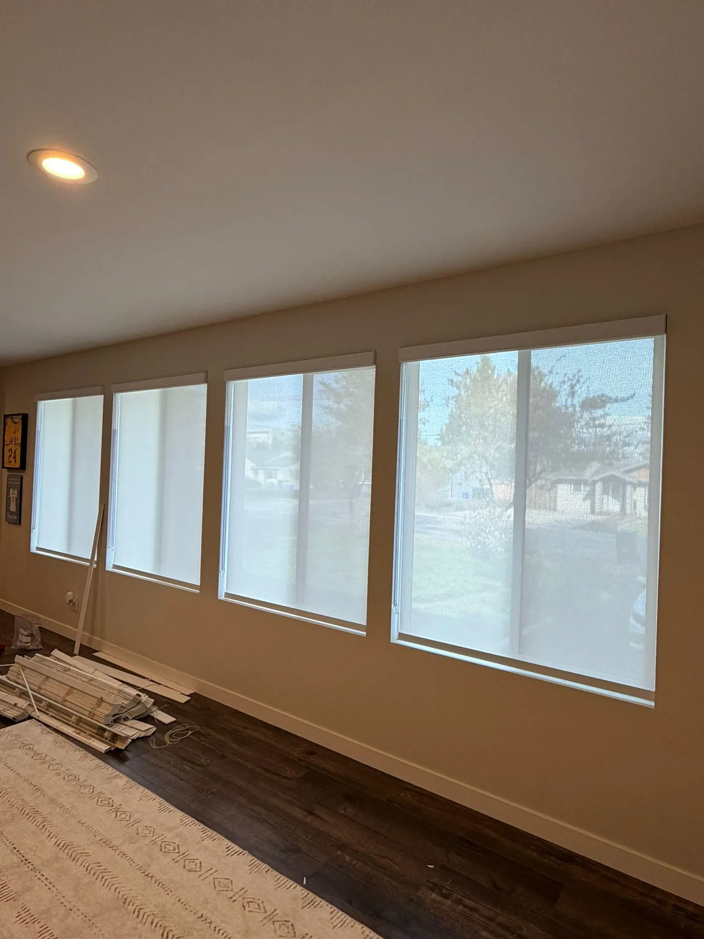 Translucent shades fitted across wide windows